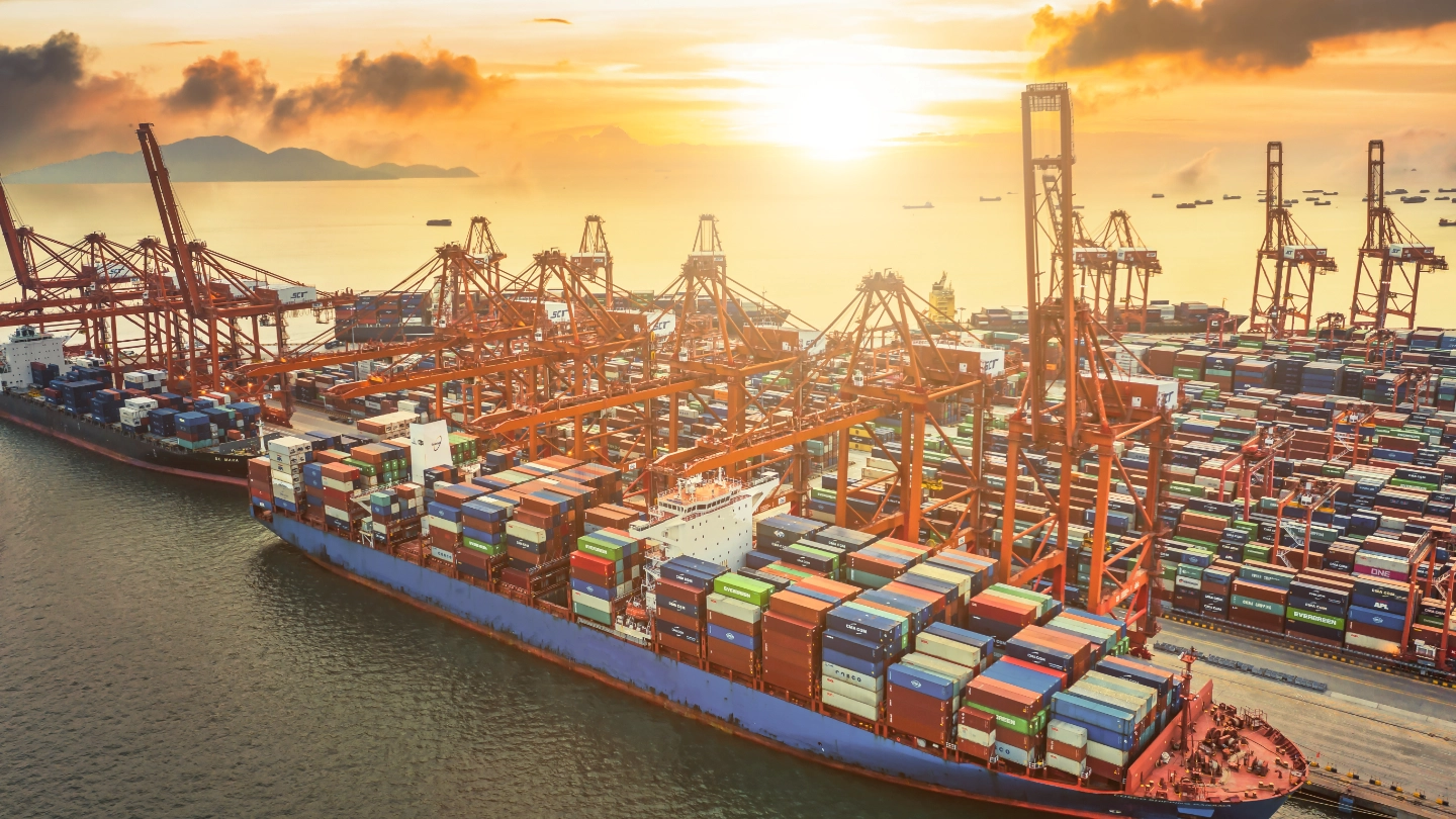 Aerial view of large ship in dock with containers Aerial view of large ship in dock with containers